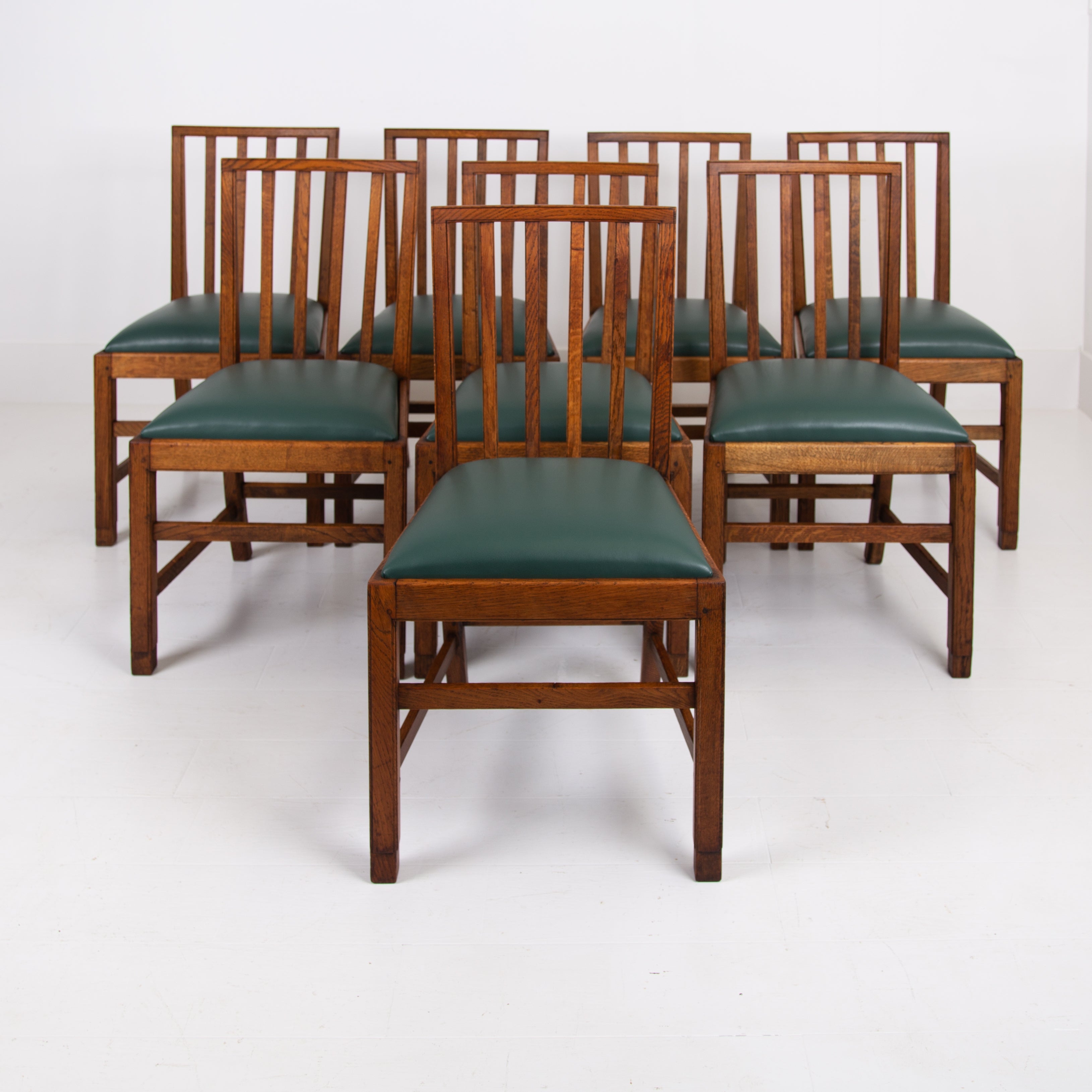 Set of 8 Gordon Russell Arts & Crafts Golden Oak Chairs 1930s