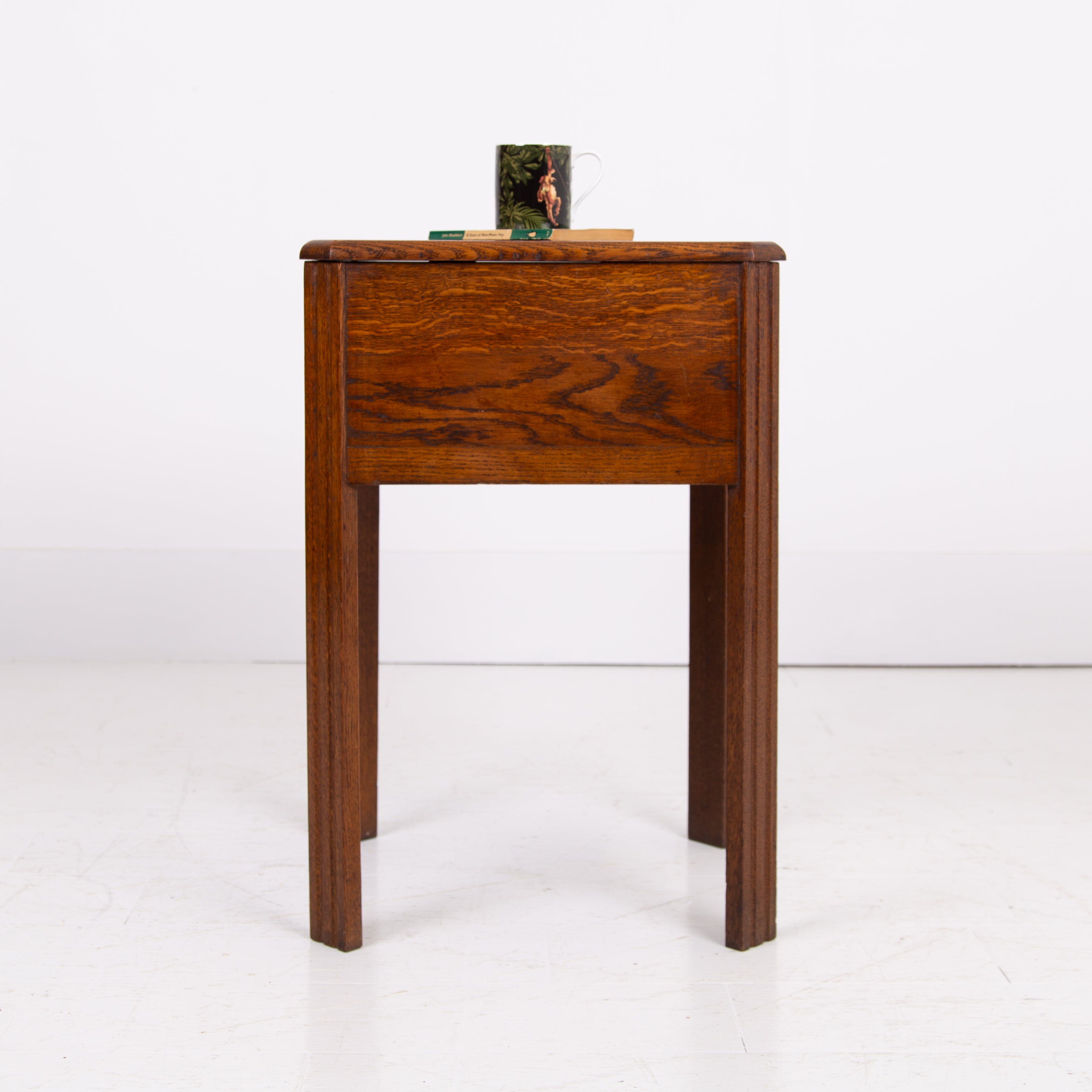 Delightfully Decorative Little Oak Side Table With Storage