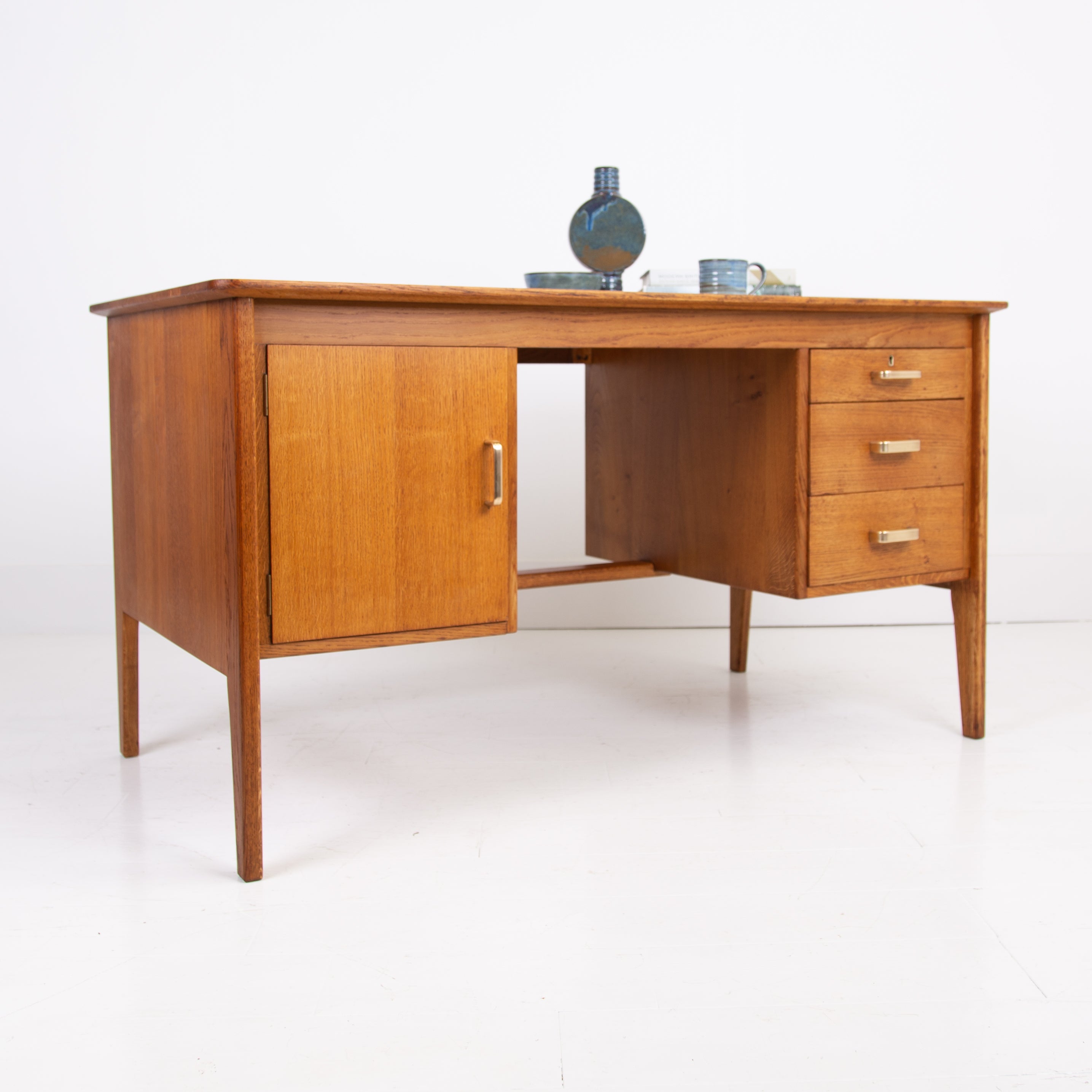 A Gordon Russell Oak Mid Century Twin Pedestal Desk