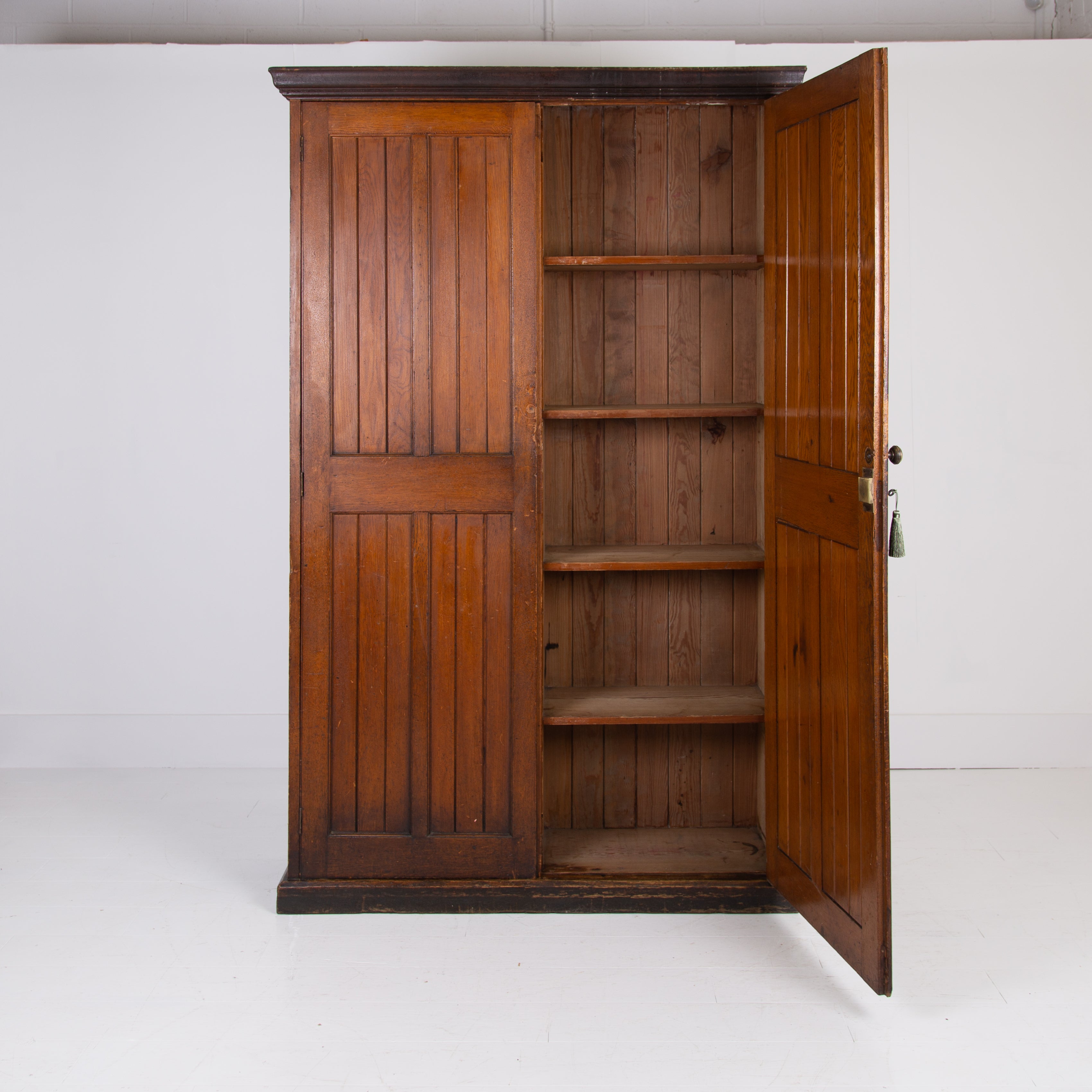 A Tall Victorian Welsh School Oak Cupboard