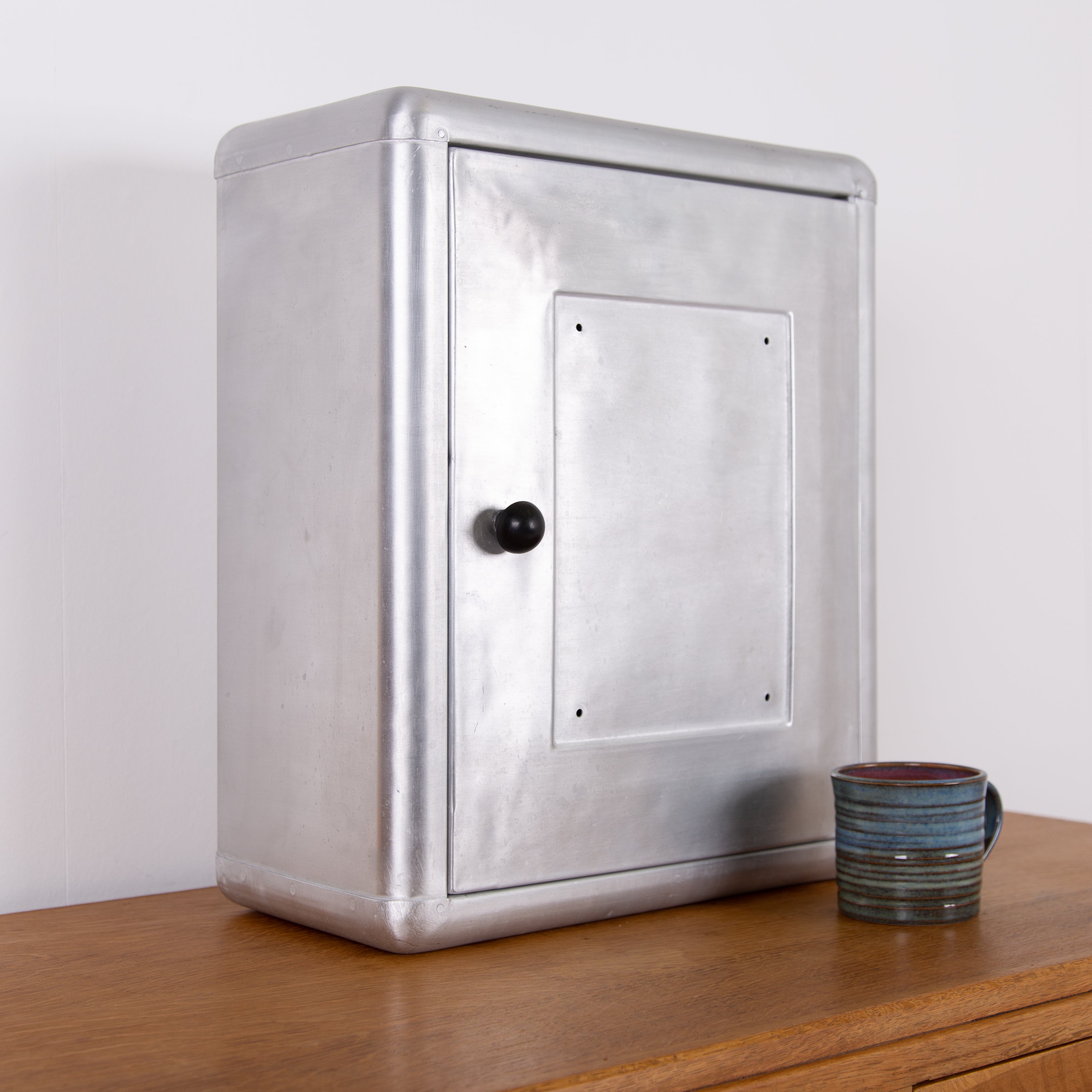 Small Pressed Aluminium Wall Cabinet C1940