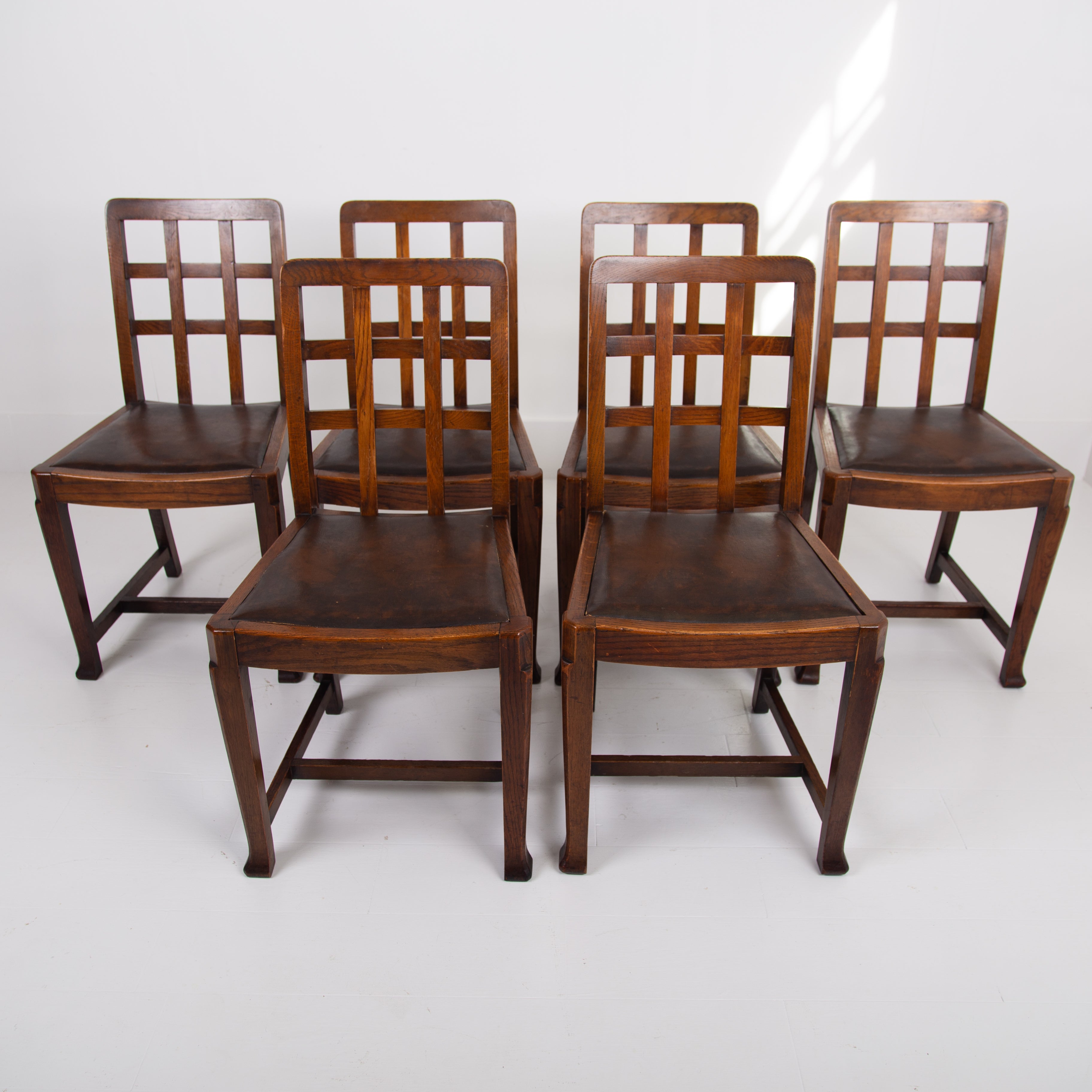 Six 1930s Heals Lattice Back Oak Dining Chairs