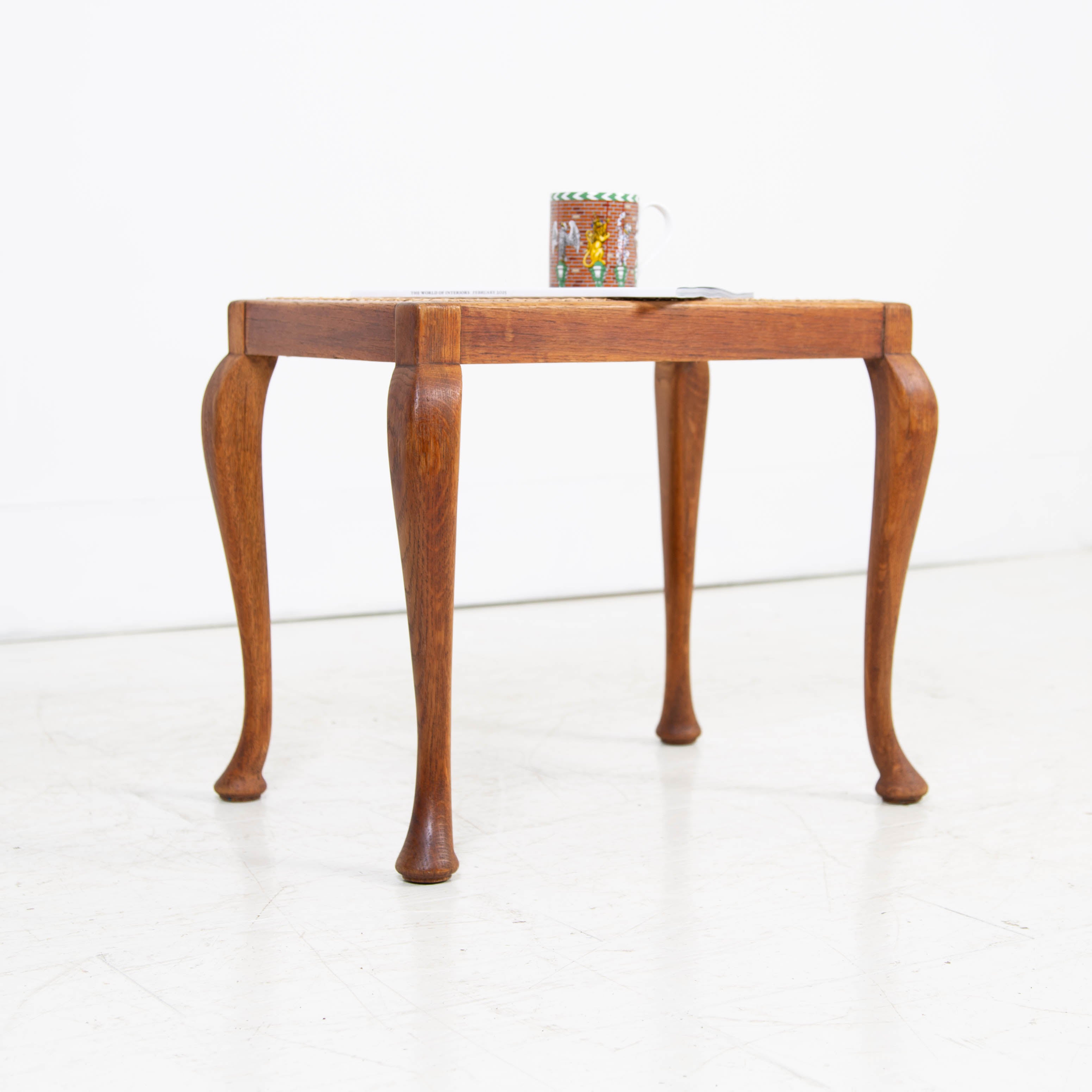 An Attractive 1920s Oak and Cane Foot Stool