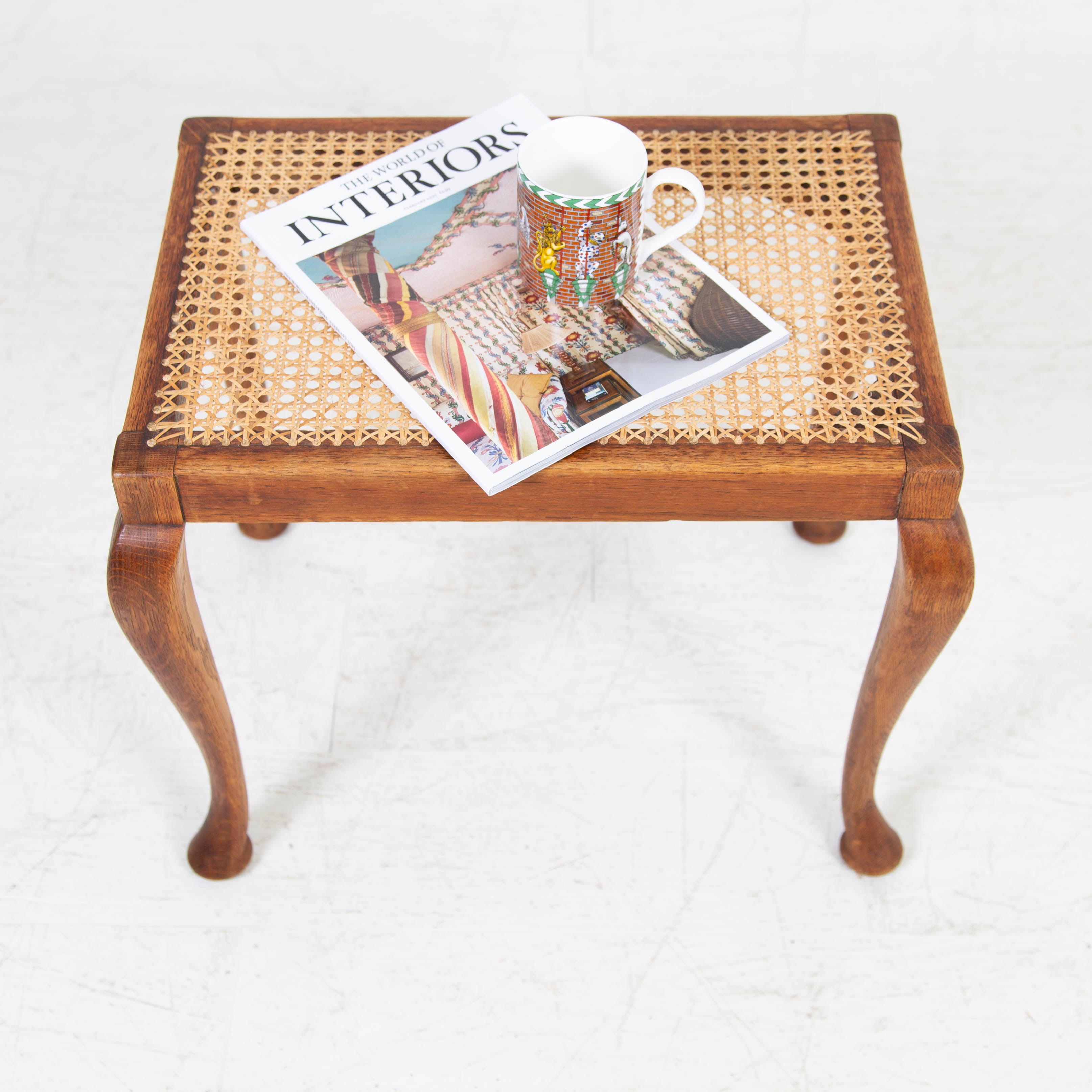 An Attractive 1920s Oak and Cane Foot Stool