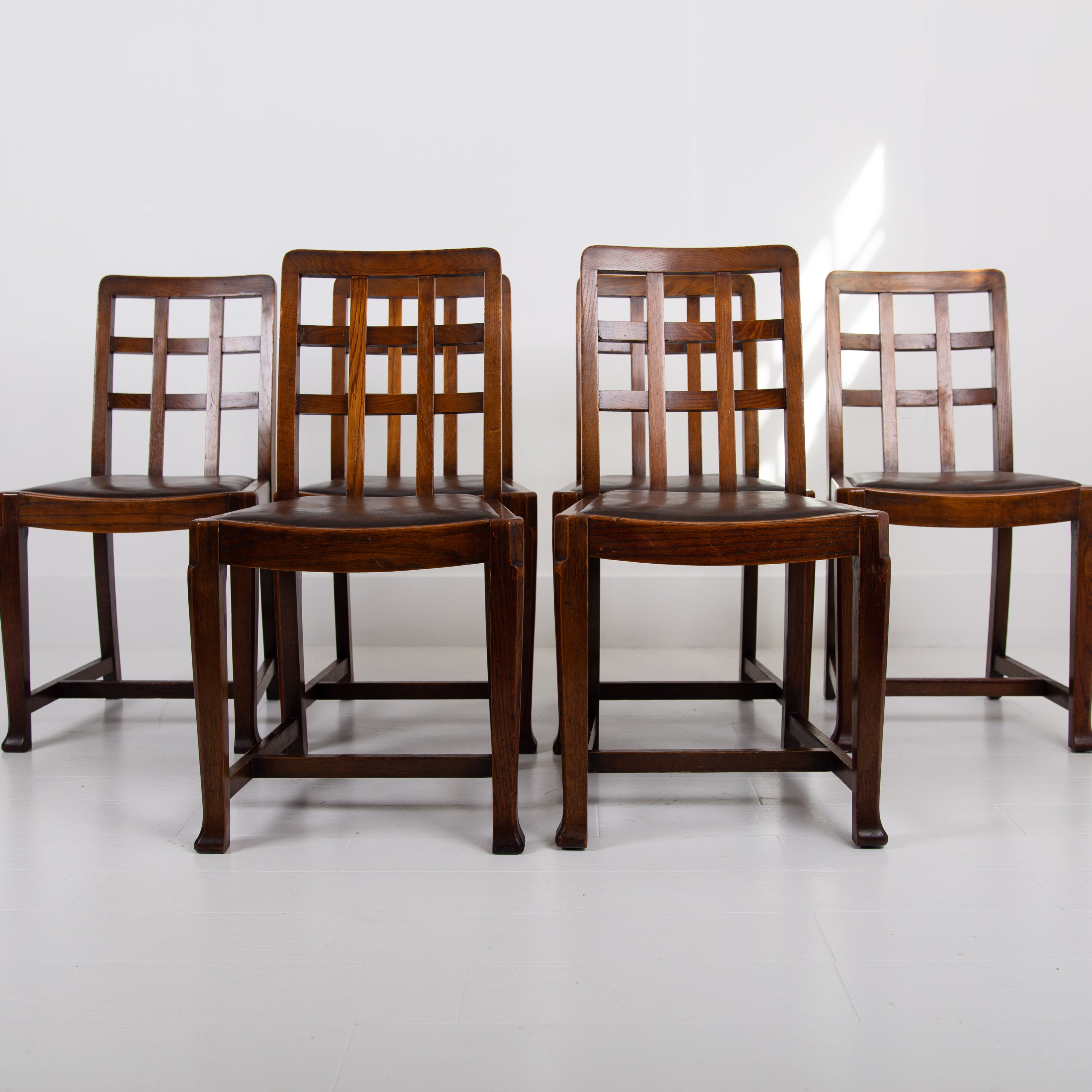 Six 1930s Heals Lattice Back Oak Dining Chairs